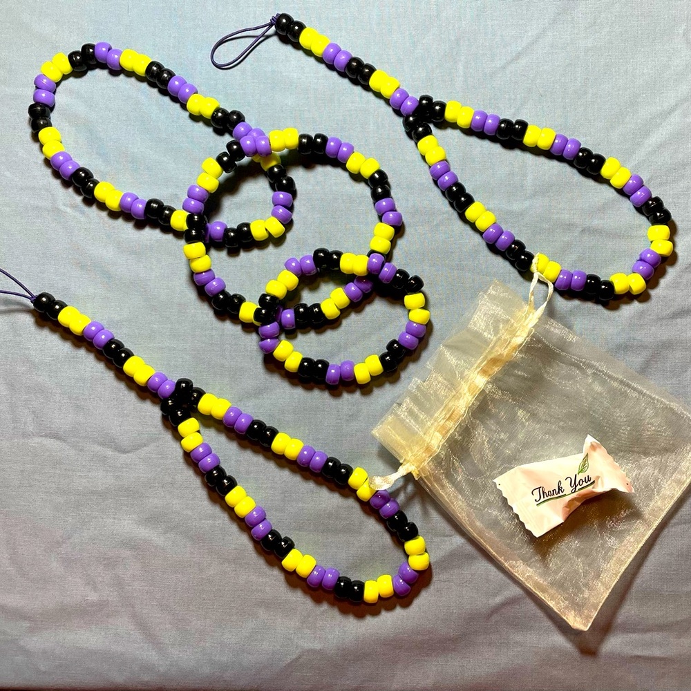 Tri-color 4-pc yellow, purple, and black beaded set for young adult.